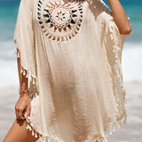Cubierta de playa con pompones