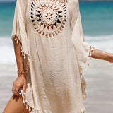 Cubierta de playa con pompones