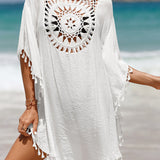 Cubierta de playa con pompones