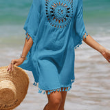 Cubierta de playa con pompones